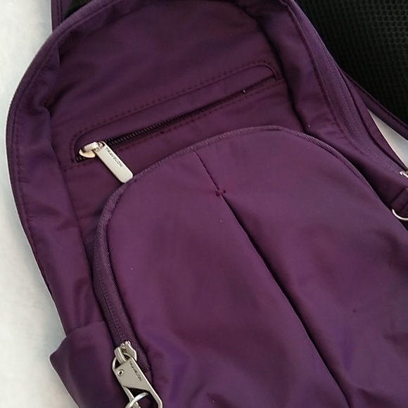 travelon sling backpacks